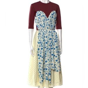 Pushbutton dress with color block and floral detail